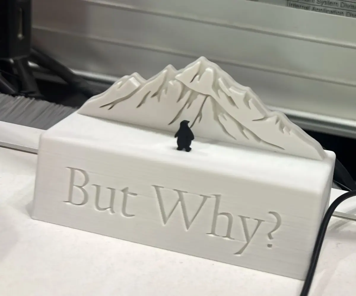 "But Why?" Penguin Sculpture